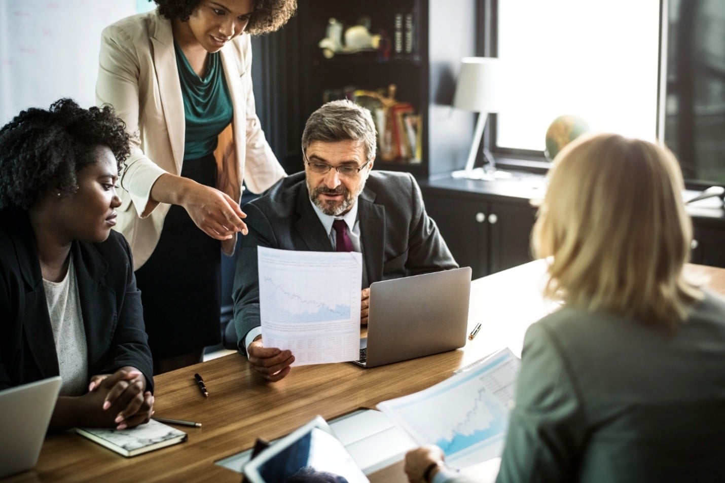 HR professional discussing a document