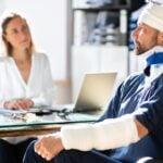 Third-Party Liability: When Someone Outside the Company Causes an Employee's Injury 7 Injured man talking to an attorney