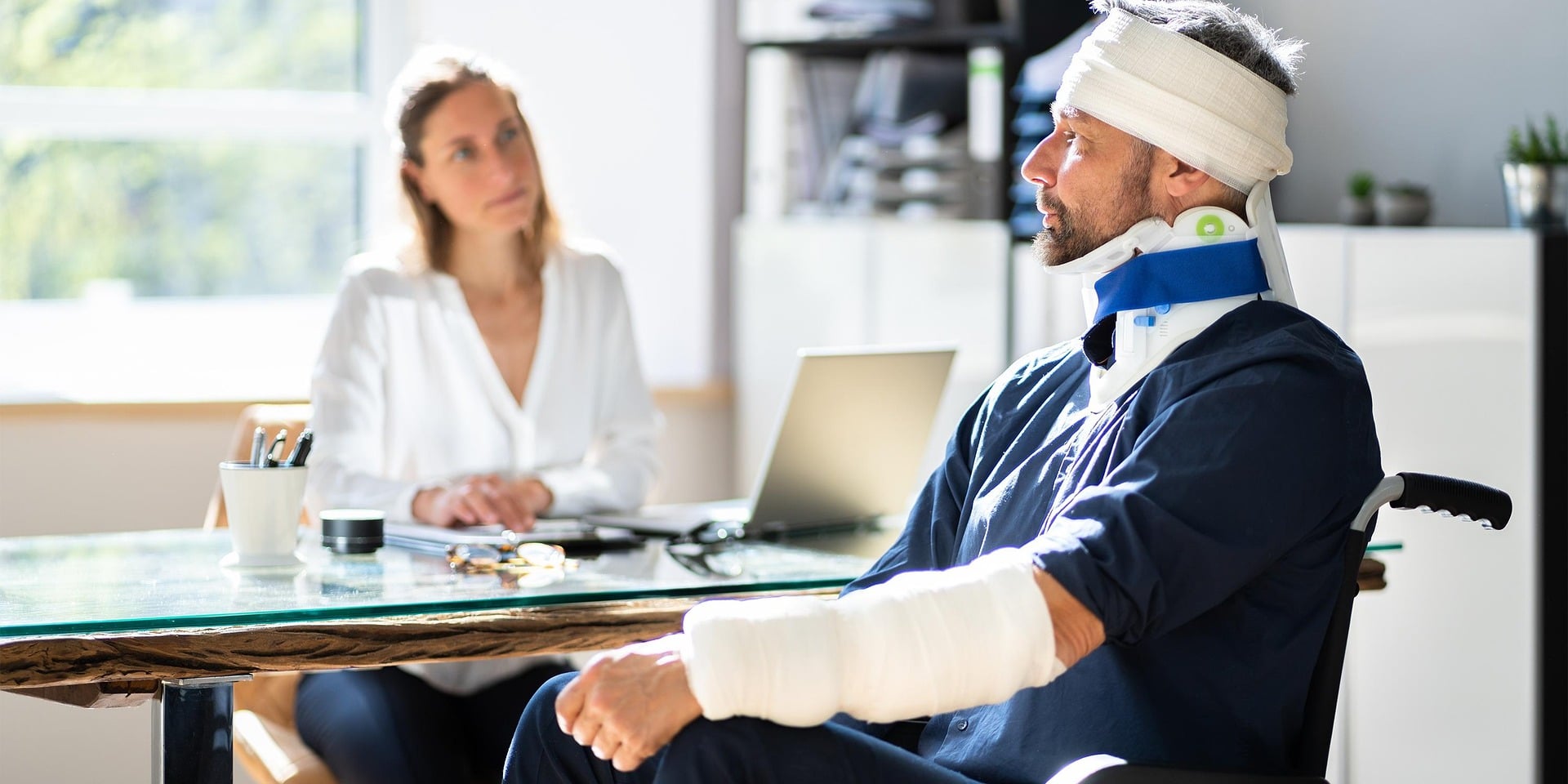 Injured man talking to an attorney
