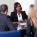 What Types of Sexual Harassment Can You Face at Work? 5 Group of managers interviewing female candidate