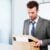 Fired businessman leaving office