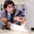 How the Labor Shortage Affects the Auto Industry 4 Leg injured employee working in the office
