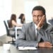 What Types of Sexual Harassment Can You Face at Work? 4 Lonely African-American businessman in office.