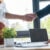 Selective focus of employee and recruiter shaking hands