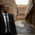 Cybersecurity in HR: Protecting Your Workforce Data in the Digital Age 7 smiling man standing between brown concrete buildings at daytime