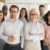 How to Design a Criminal Background Check Process for Remote and Global Hiring 10 Smiling professional business leaders and employees group