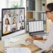 Female employee talking with remote employees
