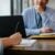 How Legal Discovery in the CSIS Action Triggered a Fraudulent Takeover 3 Woman filling job application form in office with boss