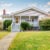 Small American home with light exterior and white trim. — Stock Photo, Image Remove BG Save Share Sample Small American home with light exterior and white trim