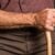 The HR Guide to Employee Prescription Management 9 Elderly man holding a walking stick