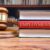 Employment law books and a gavel on a table