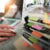 From First Click to Signed Client: Rethinking Lead Generation for Modern Law Firms 2 Business documents on office table with smart phone and laptop