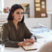 Guessing Game 10 Portrait of female HR manager talking to employee in office
