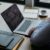 How the Labor Shortage Affects the Auto Industry 5 Lawyer using laptop at modern workplace with coffee and documents
