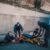 How the Labor Shortage Affects the Auto Industry 5 Emergency team helps an injured person on the street with a stretcher nearby
