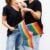 Blended Families Face Legal Questions That Standard Divorce Advice Was Never Designed to Answer 7 Two women wearing black shirts hold rainbow flags in a show of support for LGBTQ+ rights