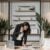 4 Best Real Estate Lawyers in the Dominican Republic 8 A professional woman lawyer multitasking in a modern office environment, reviewing documents